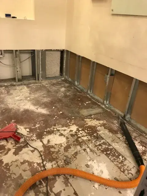 Roof and ice dam leak water damage being dried in an Enfield, CT home